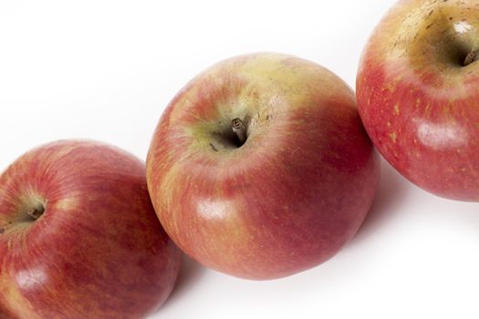 Gala apples with varying skin blemishes.