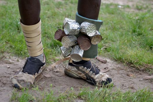 musical instruments in the feet of an indigenous