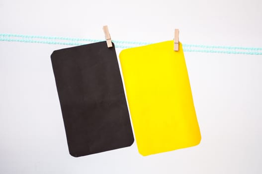 yellow and black hang paper for note