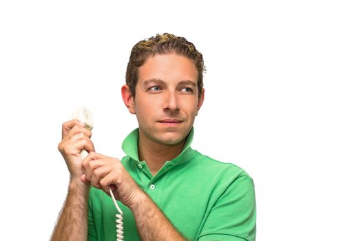 Good looking guy holding the line on phone