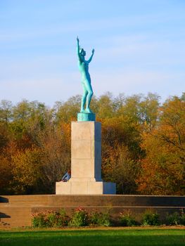 Monticello, IL United States - November 02, 2007: The Sun Singer sculpture of Robert Allerton Park near Monticello, Illinois. The bronze sculpture was created by Carl Milles in the year 1929.