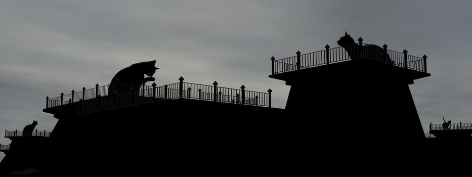 Shadow of many cats on roofs by cloudy falling night