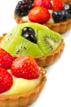 Fresh fruit tart on white background