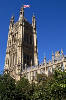 The union flag flies on the Victoria Tower of the Houses of Parliament in London.