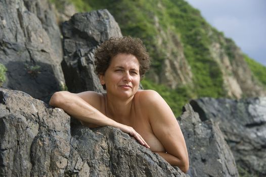 woman relaxing the bank of Japan Sea