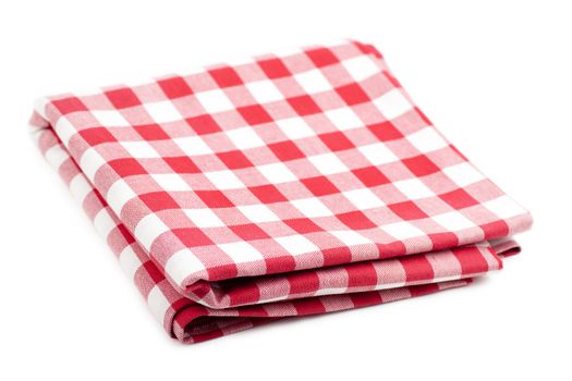 Checked with red and white tablecloth isolated over white background