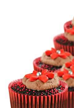 Delicious chocolate cupcakes in red