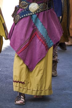 Close up view of a colorful long skirt of a gipsy.