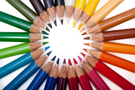 A vivid image with various colored pencils such as yellow, orange, red, pink and blue.