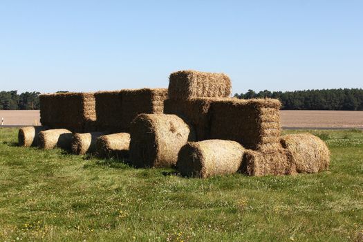 Tractor made of hay bales on a lawn in field