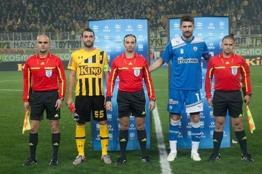 THESSALONIKI, GREECE - OCTOBER 23: Souvenir picture referees and members of the teams Paok and Aris before the game. A.Giahos, C. Magianis, K.Sotiropoulos, S. Prittas, K. Chalkias on October 23, 2011 in Thessaloniki, Greece