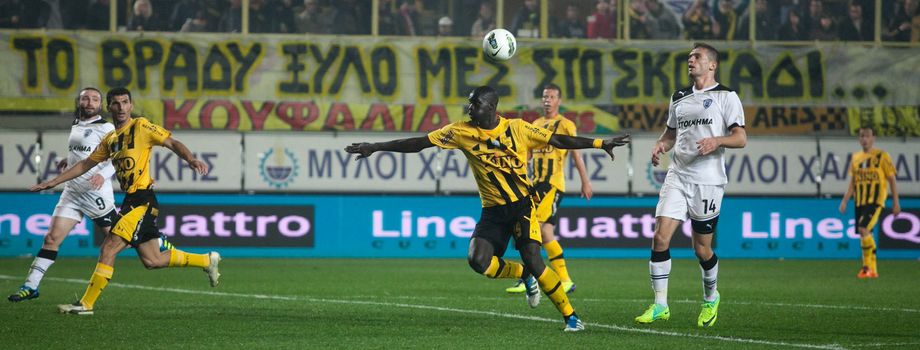 THESSALONIKI, GREECE - OCTOBER 23: Claiming the ball between players Papazoglou, Salpigidis, Khalifa Sankare in football match between Paok and Aris (1-1) on October 23, 2011 in Thessaloniki, Greece