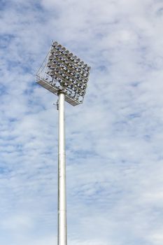 The Stadium Spot-light tower over Blue Sky