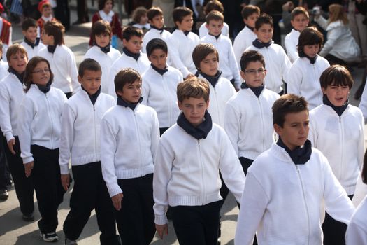 THESSALONIKI, GREECE - OCTOBER 28: Parade to celebrate the anniversary of 1940 which was the military conflict between Greece and Italy.Children holding Greek flags on October 28, 2011 in Thessaloniki