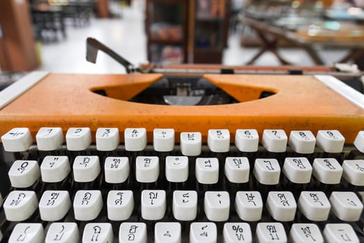 Language typewriter Thai font. In old office.