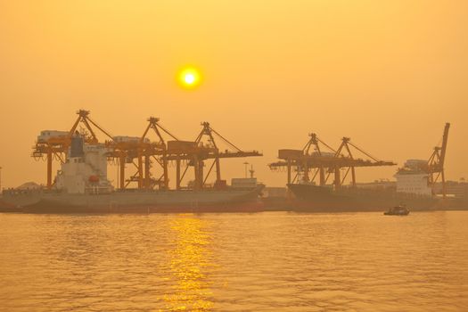 Industrial shipping port on sunset in Bangkok, Thailand