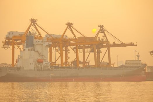 Industrial shipping port on sunset in Bangkok, Thailand