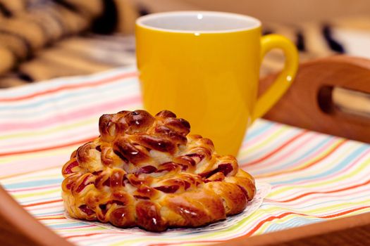 Sweet buns and tea for breakfast beautiful curled shape