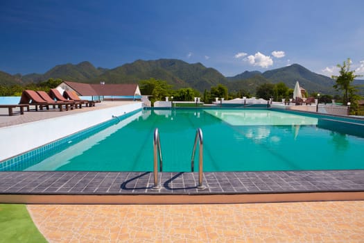 swimming pool besides mountains in Pai Maehongson ,Thailand