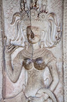 bas-relief of the woman Apsara on wall Angkor Wat. Cambodia