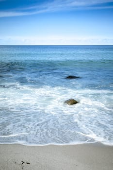 An image of a beautiful beach and the blue sky