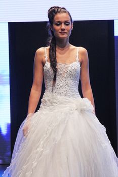 ZAGREB, CROATIA - OCTOBER 27: Fashion model wears wedding dress made by In Bety on 'Wedding days' show, October 27, 2012 in Zagreb, Croatia.