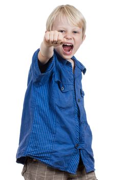 An angry young boy punching and screaming