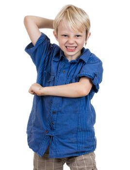 An aggressive young boy about to hit. Isolated on white.