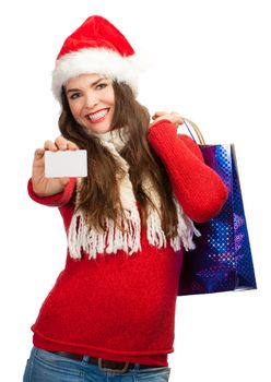 A beautiful woman wearing a Christmas hat and holding shopping bags and a blank business card.