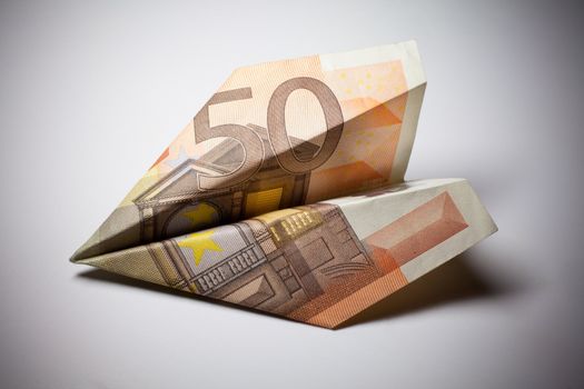 Paper airplane model made of money. Was used banknotes of 50 euro.