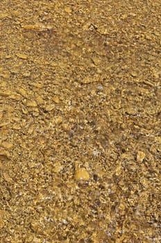 Detail of polluted riverbed of Mosteirao, downstream abandoned pyrite mine of S. Domingos , Mertola, Portugal