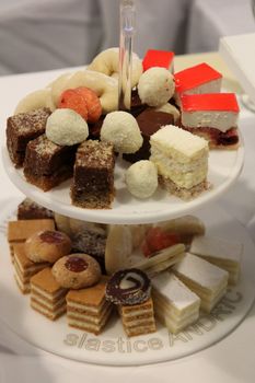 Colorful desserts and pastry served on a wedding party