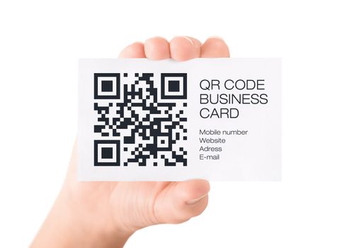 Hand showing visit card with QR code information. Isolated on white.