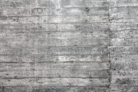 Reinforced concrete wall useful as a background