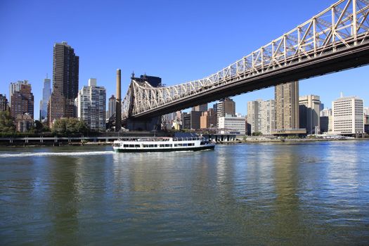 Queensboro Bridge Spanning the East River in New York City on a sunny day