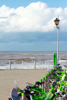 Bicycle rent on the beach of sea