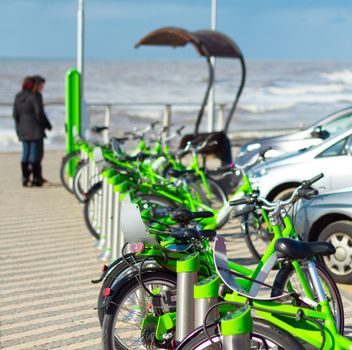 Bicycle rent on the beach of sea