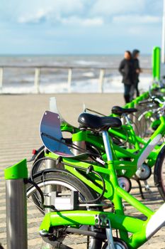 Bicycle rent on the beach of sea