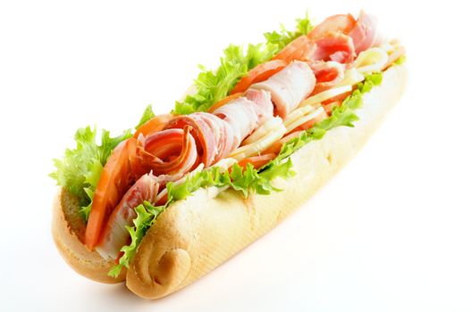 Big Tasty Baguette Sandwich with Lettuce, Tomatoes, Cheese and Ham isolated on white background
