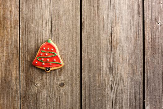 Christmas homemade gingerbread cookie over wooden table