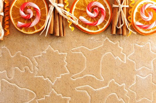 Christmas spices over homemade gingerbread dough