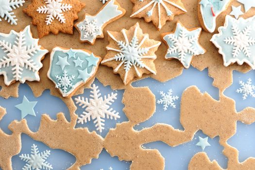Christmas homemade gingerbread cookies over dough