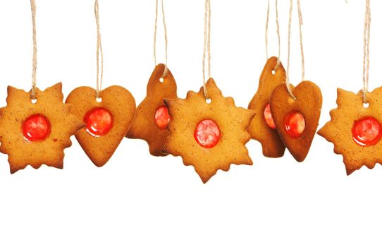 Christmas homemade gingerbread cookies over white