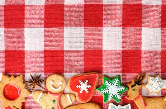 Christmas gingerbread cookies over tablecloth
