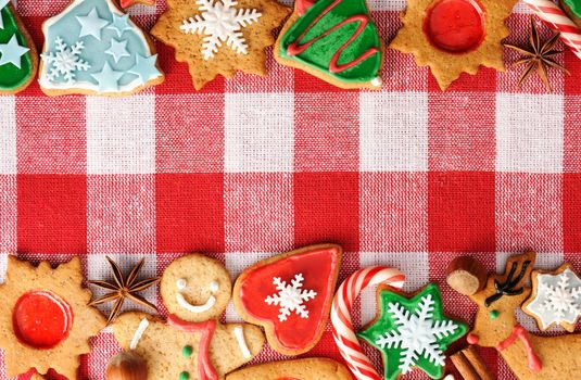Christmas gingerbread cookies over tablecloth