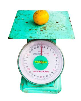 weighing machine, and citrus fruits were placed on top.