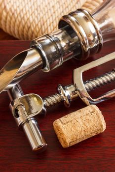  bottle with the corkscrew and wine accessories