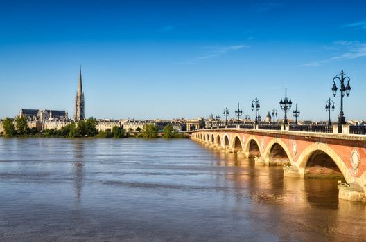Bordeaux river bridge with St Michel cathedral, Bordeaux, France