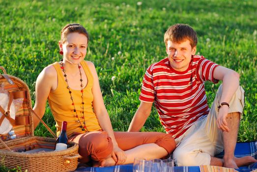 Couple on picnic at sunny day            