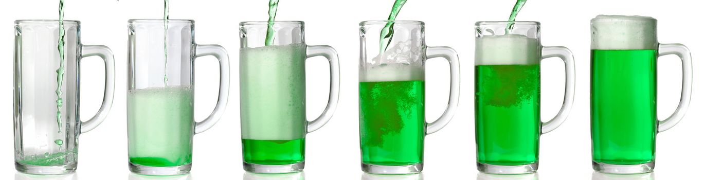 Green Beer mug isolated on white. Pouring green beer in it. 43 Mpxls.